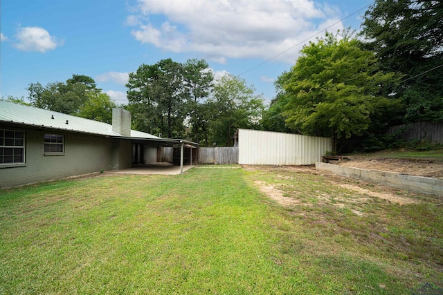 view of yard with a patio area