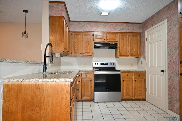 811 Georgia Ln, Longview, TX 75604 - kitchen with stainless steel electric range oven, ventilation hood, a textured ceiling, light countertops, and brown cabinetry