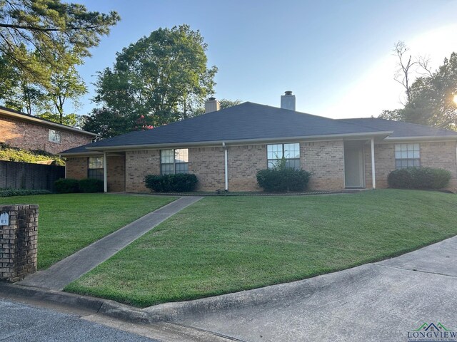 811 Georgia Ln, Longview, TX 75604 - single story home featuring a chimney and brick siding
