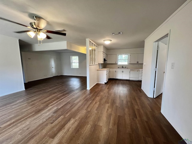 kitchen with dishwasher, dark wood-type flooring, white cabinets, sink, and ceiling fan