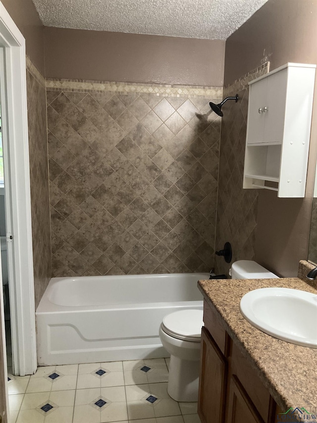 full bathroom featuring tile patterned flooring, a textured ceiling, vanity, and toilet