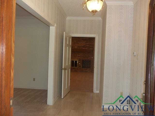 404 Moccasin Trl, Kilgore, TX 75662 - hall featuring wallpapered walls, crown molding, and baseboards