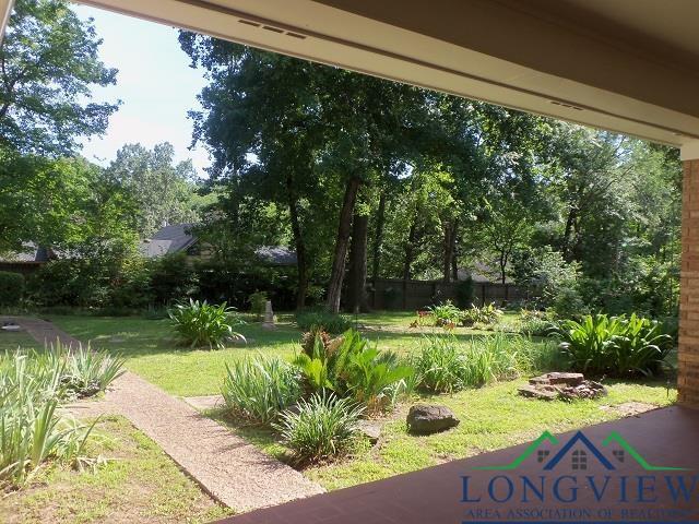 404 Moccasin Trl, Kilgore, TX 75662 - view of yard with view of scattered trees