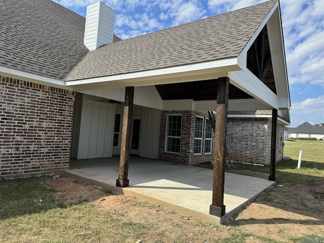 back of house featuring a patio area