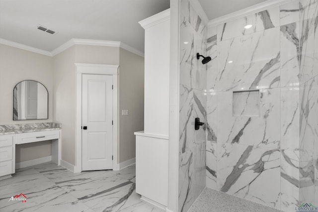 bathroom featuring tiled shower, vanity, and ornamental molding