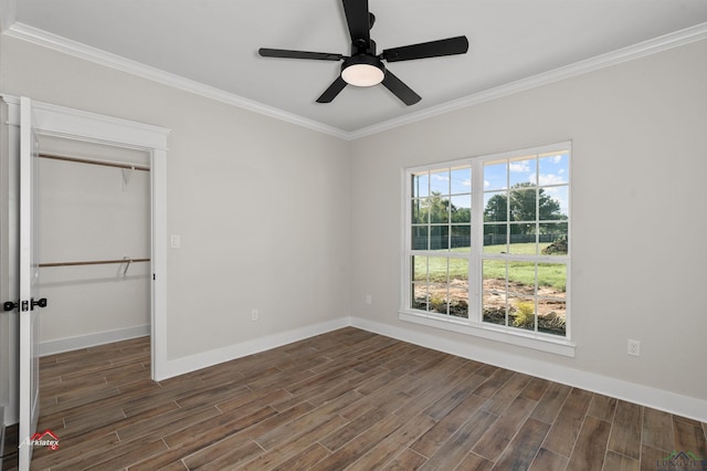 unfurnished bedroom with a closet, ceiling fan, and crown molding