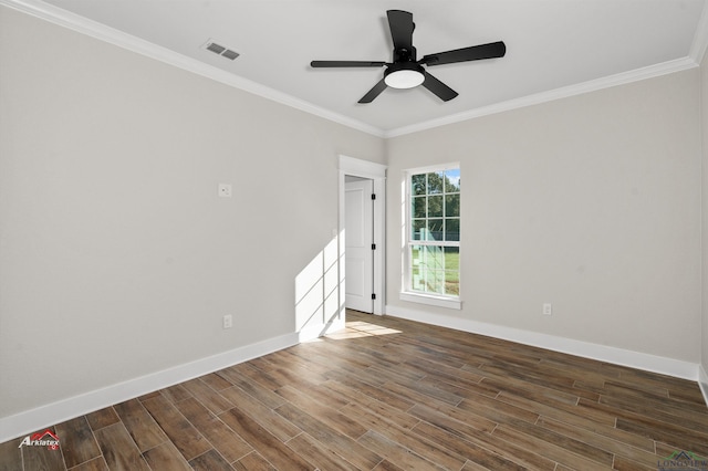 unfurnished room featuring ceiling fan and ornamental molding