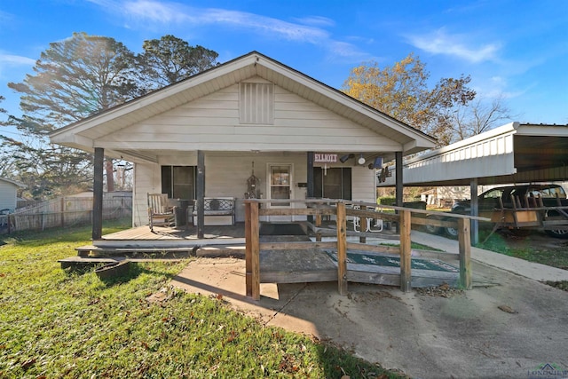 back of house with covered porch