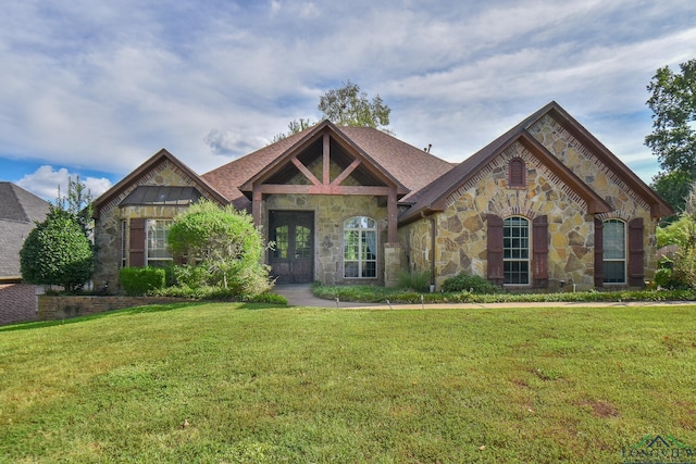 1326 Hermitage Ct, Tyler, TX 75703 - view of front of property with stone siding and a front lawn