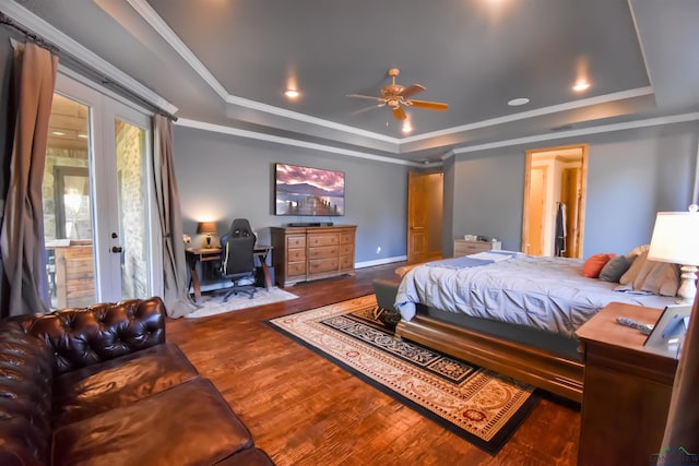 1326 Hermitage Ct, Tyler, TX 75703 - bedroom featuring a tray ceiling, wood finished floors, an office area, and ornamental molding
