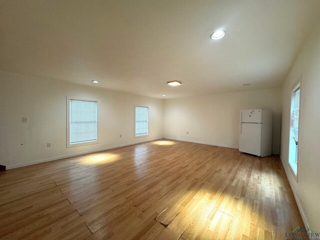 308 E 14th St, Mount Pleasant, TX 75455 - unfurnished room with baseboards, recessed lighting, and light wood-type flooring