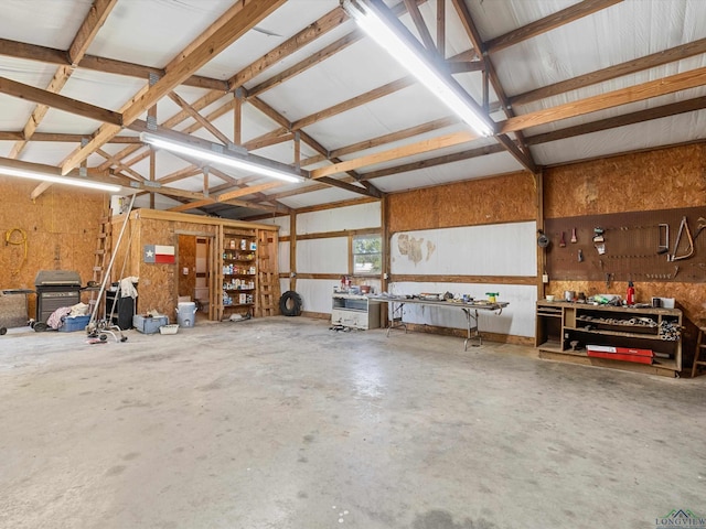 garage with a workshop area