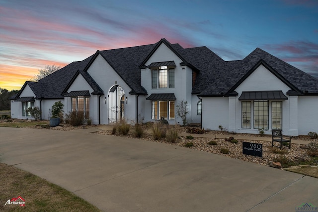 view of french country inspired facade