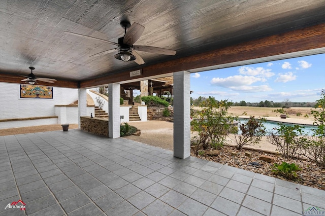 view of patio / terrace with ceiling fan