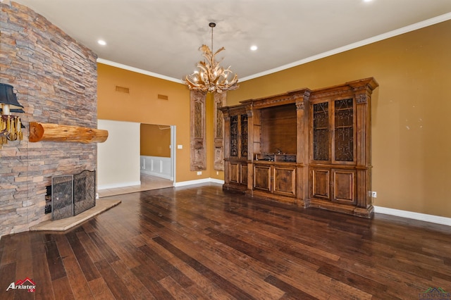 unfurnished living room featuring dark hardwood / wood-style floors, ornamental molding, and a fireplace