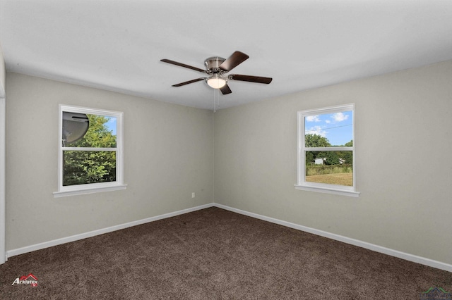 carpeted empty room with ceiling fan