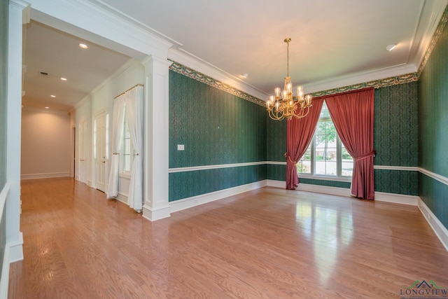 7 Summer Creek Way, Longview, TX 75604 - unfurnished room featuring crown molding, a chandelier, wood finished floors, wallpapered walls, and recessed lighting