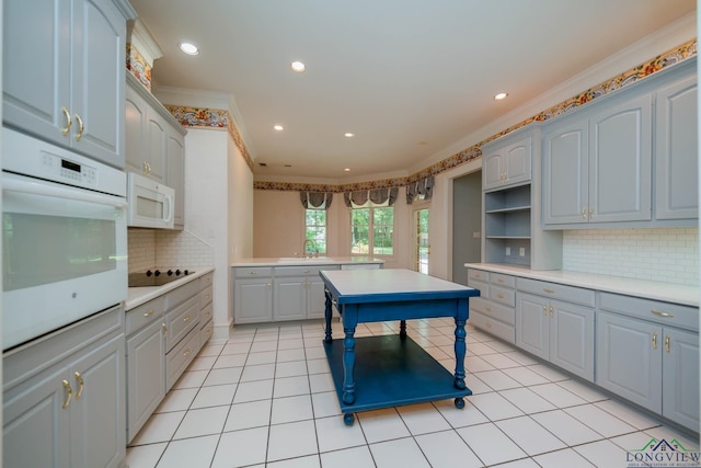 7 Summer Creek Way, Longview, TX 75604 - kitchen with white appliances, ornamental molding, gray cabinetry, light countertops, and recessed lighting