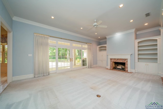 7 Summer Creek Way, Longview, TX 75604 - unfurnished living room with a ceiling fan, carpet flooring, a brick fireplace, recessed lighting, and ornamental molding