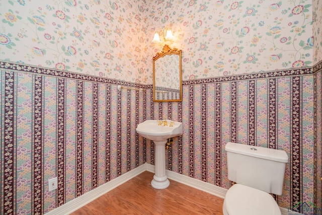 7 Summer Creek Way, Longview, TX 75604 - bathroom featuring wood finished floors and toilet