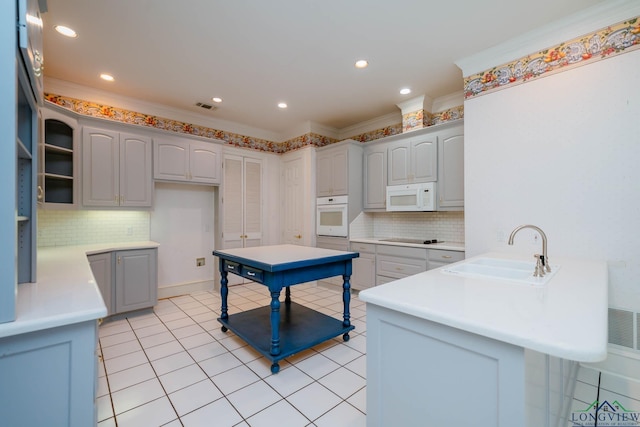 7 Summer Creek Way, Longview, TX 75604 - kitchen featuring white appliances, a peninsula, backsplash, ornamental molding, and light tile patterned floors