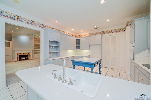 7 Summer Creek Way, Longview, TX 75604 - kitchen featuring light tile patterned flooring, white oven, recessed lighting, open shelves, and decorative backsplash