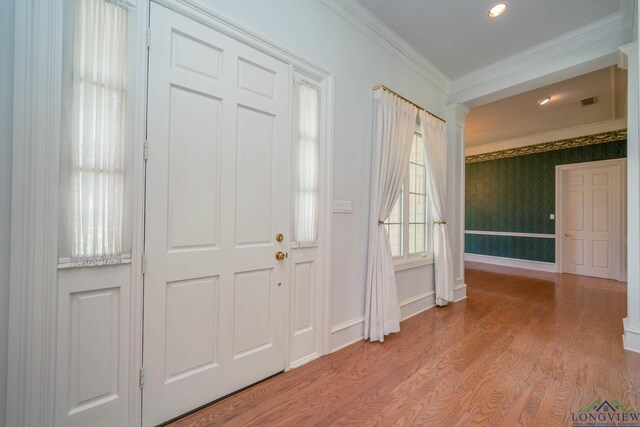 7 Summer Creek Way, Longview, TX 75604 - entrance foyer with ornamental molding, light wood-style floors, wallpapered walls, and recessed lighting