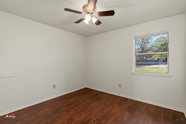 unfurnished room with a textured ceiling, ceiling fan, and dark hardwood / wood-style floors