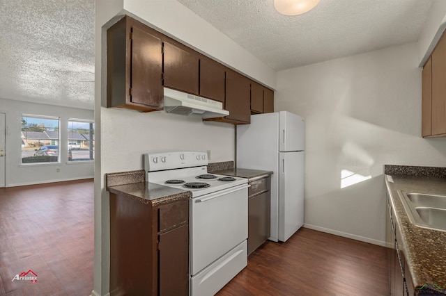 kitchen with a textured ceiling, dark brown cabinetry, dark hardwood / wood-style floors, and white appliances