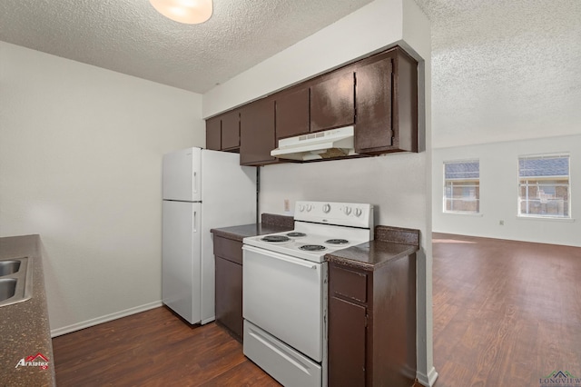 kitchen with dark hardwood / wood-style floors, dark brown cabinetry, white appliances, and a textured ceiling