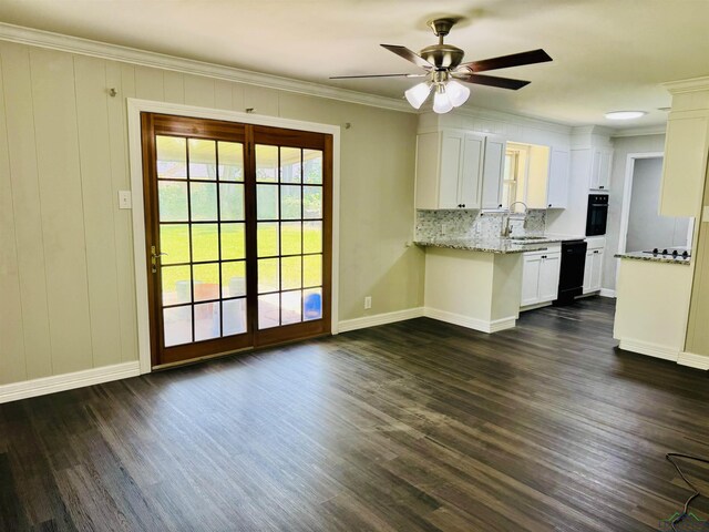 2317 Kaynell Dr, Henderson, TX 75654 - kitchen featuring crown molding, ceiling fan, light stone countertops, white cabinets, and black appliances