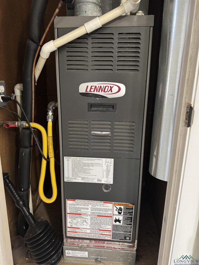 2317 Kaynell Dr, Henderson, TX 75654 - utility room with heating unit