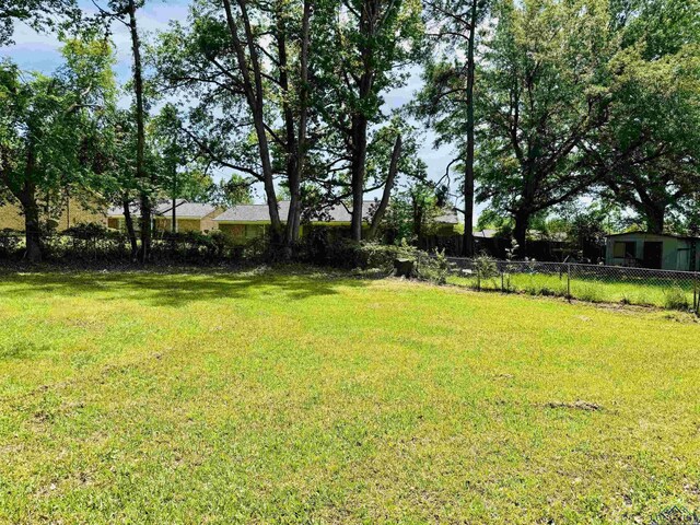 2317 Kaynell Dr, Henderson, TX 75654 - view of yard with fence