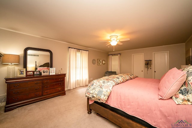 604 Woodcrest Ln, Longview, TX 75601 - bedroom featuring carpet, ceiling fan, and ornamental molding