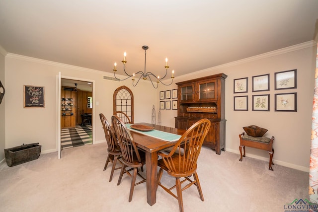 604 Woodcrest Ln, Longview, TX 75601 - dining room with a chandelier, crown molding, light colored carpet, and baseboards