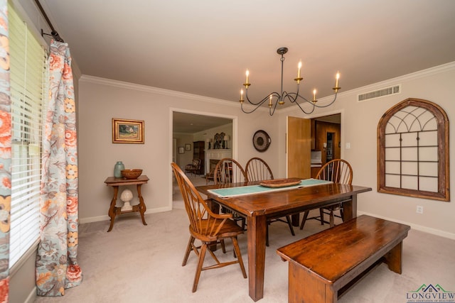 604 Woodcrest Ln, Longview, TX 75601 - dining area featuring a chandelier, ornamental molding, light carpet, and baseboards