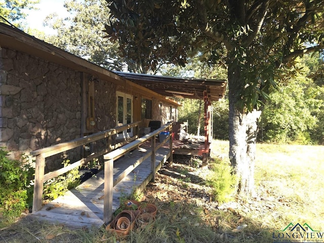 view of yard featuring a deck