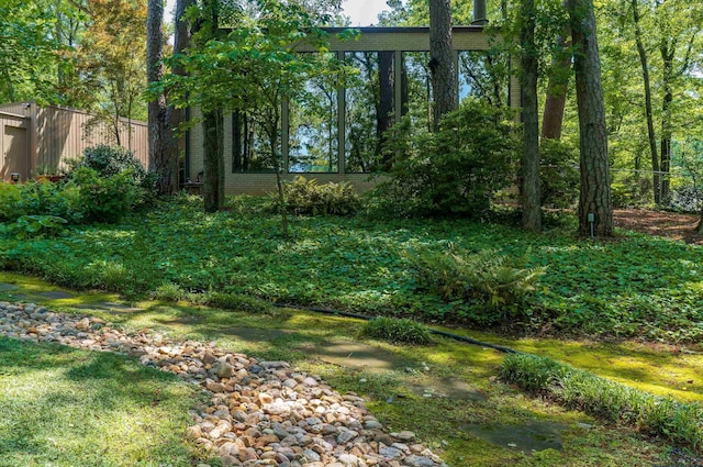 view of yard with fence