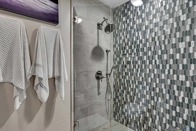 full bathroom featuring a stall shower