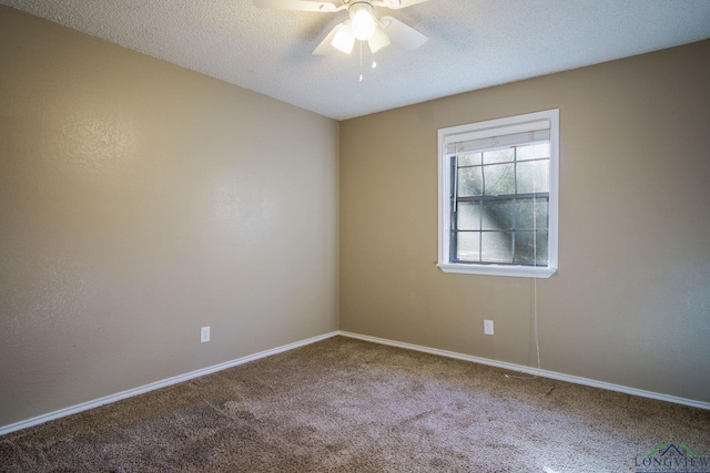 carpeted empty room featuring a textured ceiling and ceiling fan