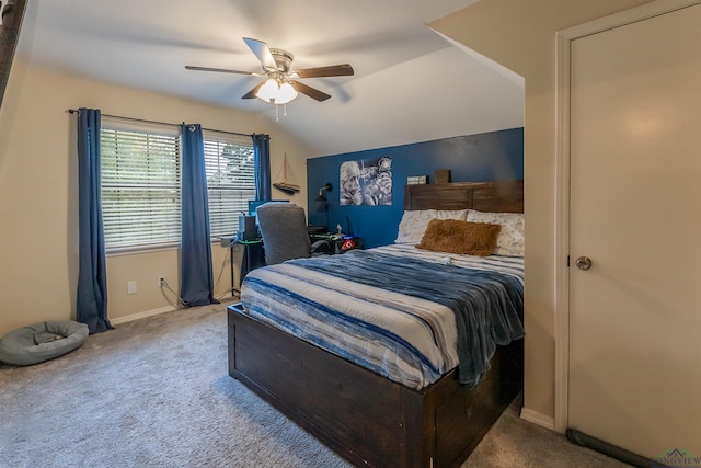 carpeted bedroom featuring ceiling fan and lofted ceiling