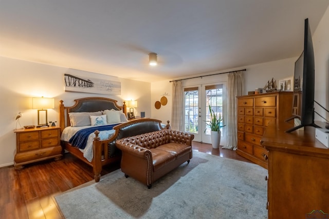 bedroom featuring hardwood / wood-style flooring, access to exterior, and french doors