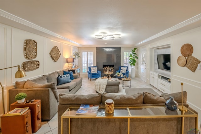 tiled living room with a fireplace and crown molding