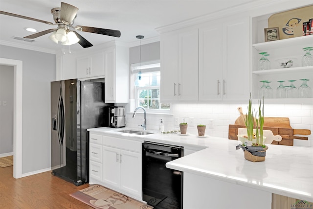 2713 Northridge Dr, Longview, TX 75605 - kitchen featuring black appliances, a sink, decorative backsplash, wood finished floors, and ceiling fan