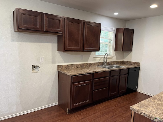 kitchen featuring dark hardwood / wood-style flooring, dark brown cabinetry, sink, and black dishwasher