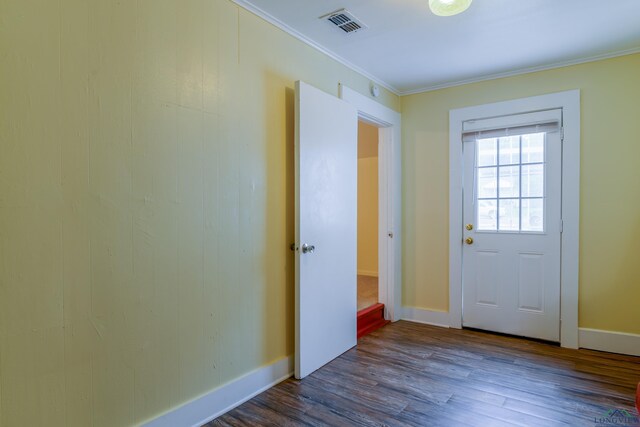 215 S Sidney St, Longview, TX 75602 - doorway to outside with dark wood-style flooring, ornamental molding, and baseboards