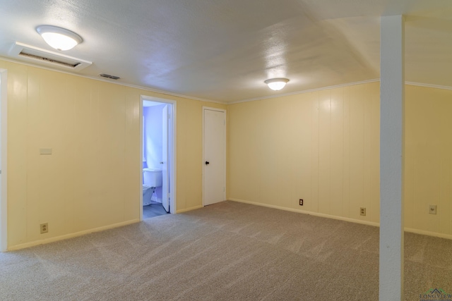 215 S Sidney St, Longview, TX 75602 - below grade area with carpet floors and crown molding
