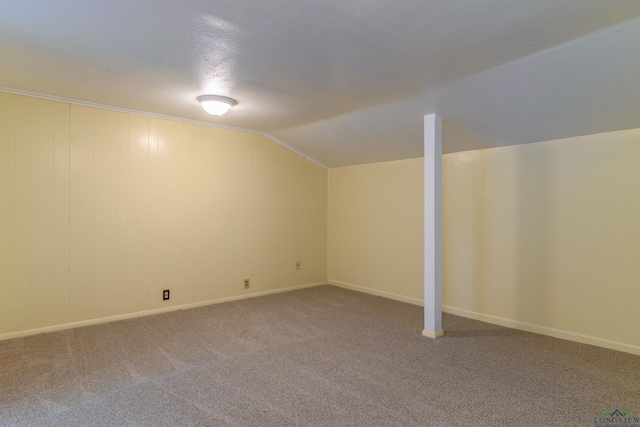 215 S Sidney St, Longview, TX 75602 - bonus room with vaulted ceiling, carpet flooring, and baseboards