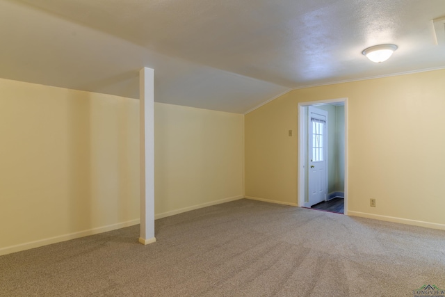 215 S Sidney St, Longview, TX 75602 - additional living space featuring carpet floors, lofted ceiling, and baseboards