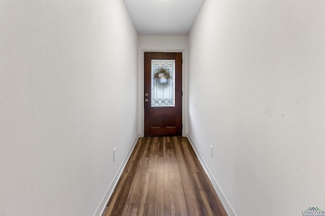 doorway to outside with hardwood / wood-style flooring